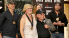 On Monday, the team behind Lee Brice's "I Drive Your Truck" gathered in Nashville to celebrate the song's reaching No. 1 on the Billboard Country Airplay chart. From left: co-songwriters Jimmy Yeary, Connie Harrington and Jessi Alexander, military father Paul Monti and singer Lee Brice. On Monday, the team behind Lee Brice's "I Drive Your Truck" gathered in Nashville to celebrate the song's reaching No. 1 on the Billboard Country Airplay chart. From left: co-songwriters Jimmy Yeary, Connie Harrington and Jessi Alexander, military father Paul Monti and singer Lee Brice.