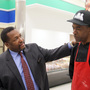 Wendell Pierce, the actor and co-owner of Sterling Farms grocery store, chats with Dwight Henry, who will be making doughnuts and buttermilk drops in the store.