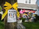 A missing poster is left on a tree outside Amanda Berry's home in Cleveland last week. A missing poster is left on a tree outside Amanda Berry's home in Cleveland last week.