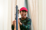 Edmar Castañeda wears a bright red cap. His electric blue harp is his orchestra at the Americas Society. <em> </em>
