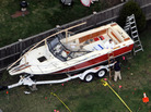 April 20 in Watertown, Mass.: Investigators work in and around the boat in which Boston bombings suspect Dzhokhar Tsarnaev was found hiding. April 20 in Watertown, Mass.: Investigators work in and around the boat in which Boston bombings suspect Dzhokhar Tsarnaev was found hiding.