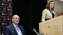 Rutgers athletics director Julie Hermann takes a question as university President Robert Barchi looks on Wednesday. Hermann' hire comes a month after the school fired its basketball coach over a video of abusive practices.