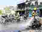 The scene Thursday in Kabul, Afghanistan, after a suicide bomber attacked a NATO convoy. The scene Thursday in Kabul, Afghanistan, after a suicide bomber attacked a NATO convoy.