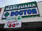 A sign outside a medical marijuana evaluation clinic in Los Angeles.