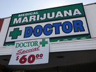 A sign outside a medical marijuana evaluation clinic in Los Angeles. A sign outside a medical marijuana evaluation clinic in Los Angeles.