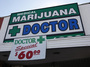 A sign outside a medical marijuana evaluation clinic in Los Angeles.