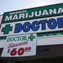 A sign outside a medical marijuana evaluation clinic in Los Angeles.