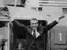 Richard Nixon says goodbye to members of his staff outside the White House as he boards a helicopter after resigning the presidency on Aug. 9, 1974.