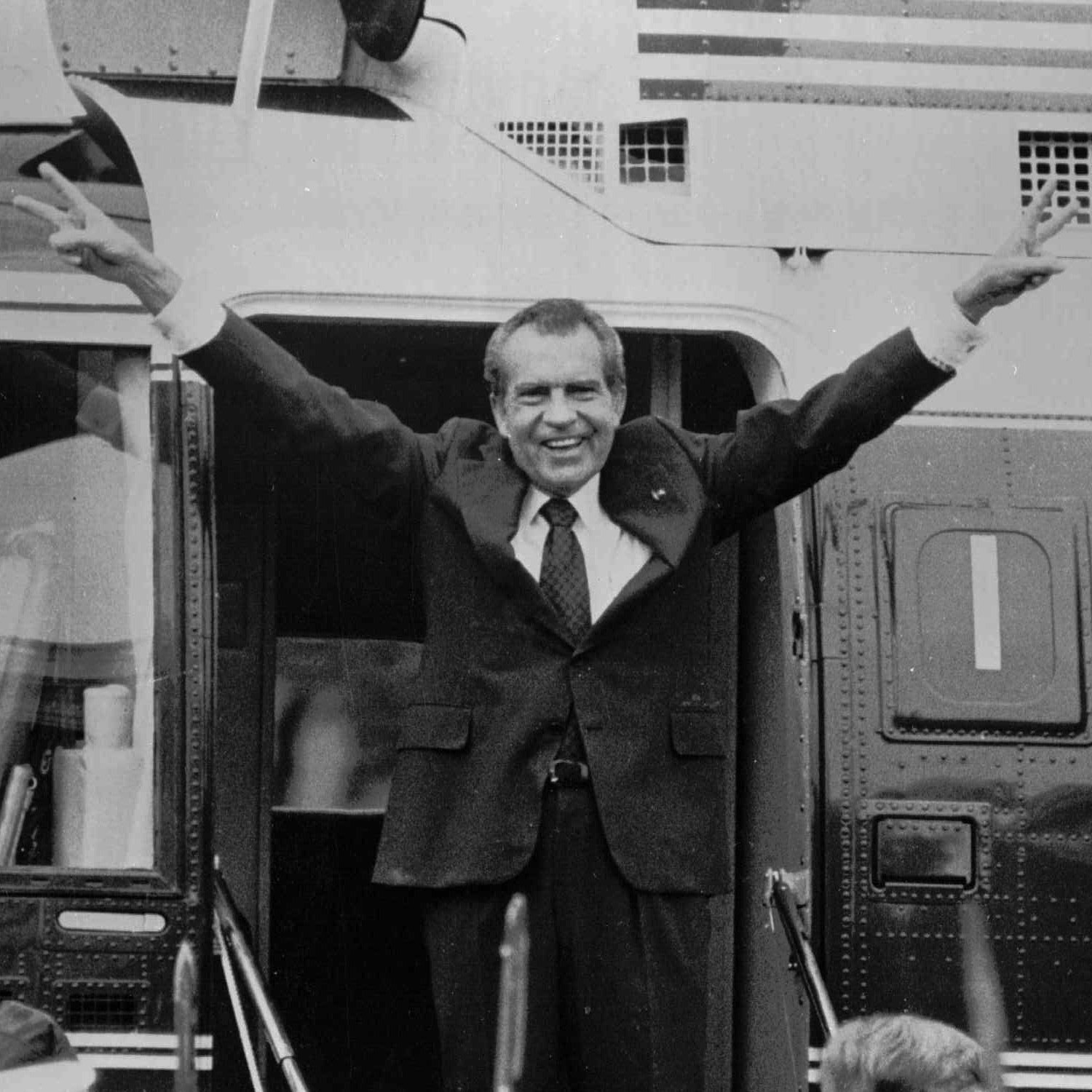 Richard Nixon says goodbye to members of his staff outside the White House as he boards a helicopter after resigning the presidency on Aug. 9, 1974.