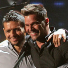 Former bandmates Draco Rosa and Ricky Martin, seen here on stage at Univision's 2013 Premio Lo Nuestro awards celebration, reunite on Rosa's new album, Vida. Former bandmates Draco Rosa and Ricky Martin, seen here on stage at Univision's 2013 Premio Lo Nuestro awards celebration, reunite on Rosa's new album, Vida.