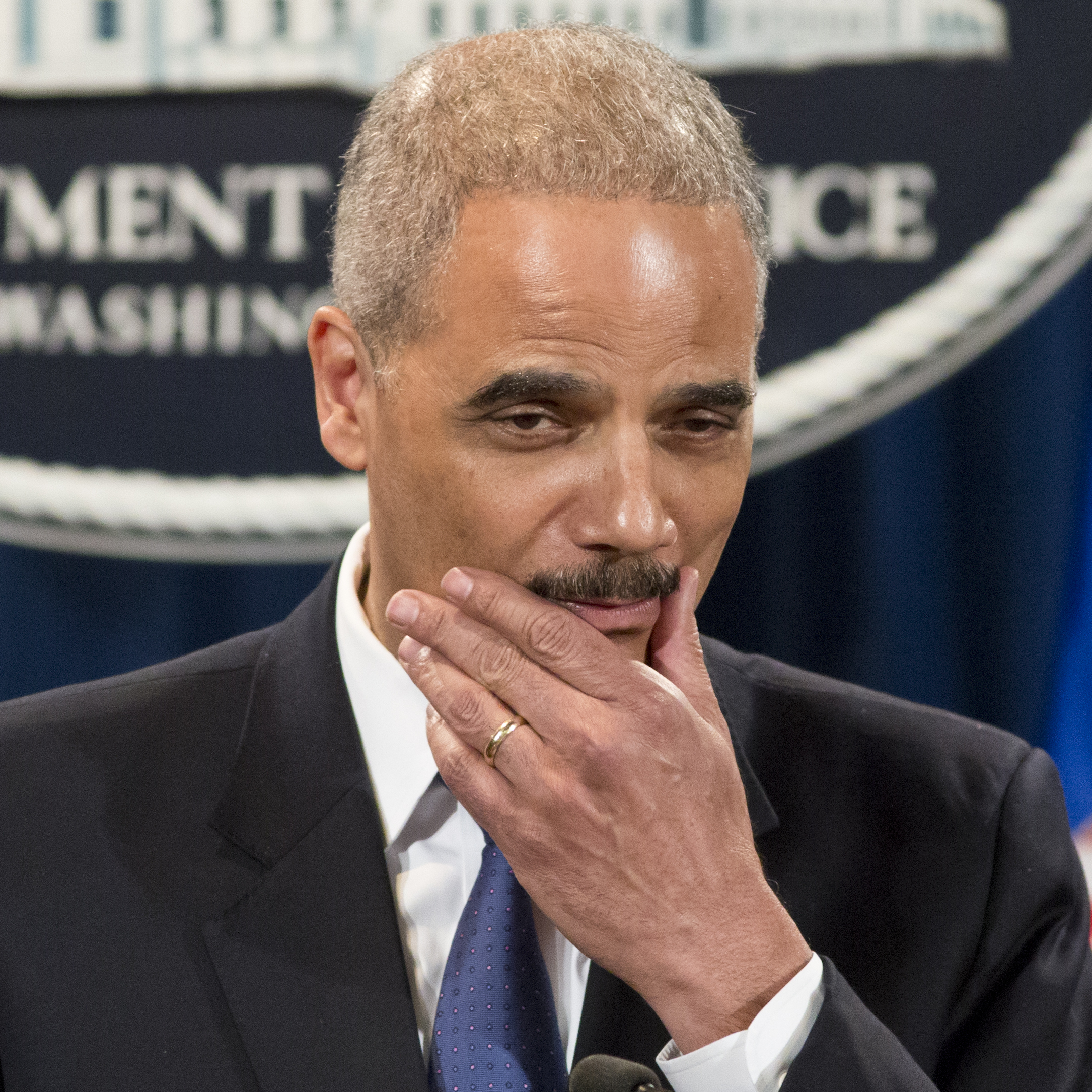 Attorney General Eric Holder pauses during a May 14 news conference on the IRS.