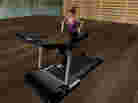 A player avatar runs on a treadmill in the virtual world of Second Life. Researchers used the online game to see if it could help people maintain weight loss habits in the real world.