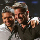 Former bandmates Draco Rosa and Ricky Martin, seen here on stage at Univision's 2013 Premio Lo Nuestro awards celebration, reunite on Rosa's new album, Vida. Former bandmates Draco Rosa and Ricky Martin, seen here on stage at Univision's 2013 Premio Lo Nuestro awards celebration, reunite on Rosa's new album, Vida.