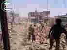 Syrians inspect Saturday the rubble of buildings damaged by government airstrikes in Qusair, Syria. The image was provided by Qusair Lens, and was authenticated based on its contents and other AP reporting.