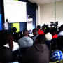 Kenyans watch a presentation at the "mobile apps garage showcase" this in Nairobi.