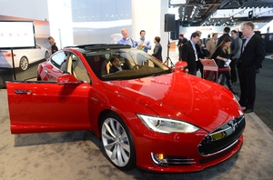 The Tesla Model S, Motor Trend Car of the Year, is introduced at the 2013 North American International Auto Show, in Detroit in January. Tesla's attempts to sell its cars without going through dealerships is meeting resistance. The Tesla Model S, Motor Trend Car of the Year, is introduced at the 2013 North American International Auto Show, in Detroit in January. Tesla's attempts to sell its cars without going through dealerships is meeting resistance.
