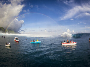 Boats line up to photograph this year's Teahupoo swell in Tahiti. Boats line up to photograph this year's Teahupoo swell in Tahiti.