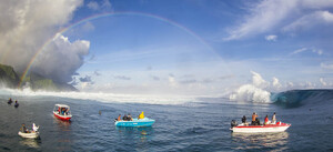 Boats line up to photograph this year's Teahupoo swell in Tahiti.