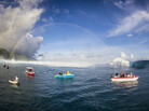 Boats line up to photograph this year's Teahupoo swell in Tahiti. Boats line up to photograph this year's Teahupoo swell in Tahiti.