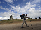A pilgrim walks the Way of St. James outside Santiago de Compostela, northwestern Spain, on July 21, 2010. The ancient religious pilgrimage is also attracting the nonreligious these days. A pilgrim walks the Way of St. James outside Santiago de Compostela, northwestern Spain, on July 21, 2010. The ancient religious pilgrimage is also attracting the nonreligious these days.