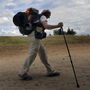 A pilgrim walks the Way of St. James outside Santiago de Compostela, northwestern Spain, on July 21, 2010. The ancient religious pilgrimage is also attracting the nonreligious these days.