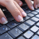 Typing hands.