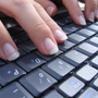 Typing hands.