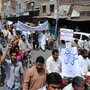 Protesters march against prolonged power outages in Faisalabad, Pakistan, last month. The country faces power outages of more than 18 hours a day in some parts of the country.