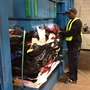 Worker Charles Lee sorts through clothes at Mac Recycling near Baltimore. Textile recycling is a huge international business, and a small facility like Mac ships about 80 tons of clothes each week to buyers around the world. Worker Charles Lee sorts through clothes at Mac Recycling near Baltimore. Textile recycling is a huge international business, and a small facility like Mac ships about 80 tons of clothes each week to buyers around the world.