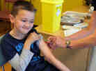 Luke Tanner, 7, gets vaccinated for measles at a clinic near Swansea, Wales, in April. Wales is at the center of a measles outbreak that has been linked to one death. Luke Tanner, 7, gets vaccinated for measles at a clinic near Swansea, Wales, in April. Wales is at the center of a measles outbreak that has been linked to one death.