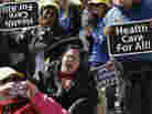 Protesters march on the Texas Capitol in Austin on March 5, demanding that lawmakers expand Medicaid to include an additional 1.5 million poor people. Protesters march on the Texas Capitol in Austin on March 5, demanding that lawmakers expand Medicaid to include an additional 1.5 million poor people.