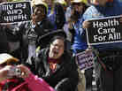 Protesters march on the Texas Capitol in Austin on March 5, demanding that lawmakers expand Medicaid to include an additional 1.5 million poor people. Protesters march on the Texas Capitol in Austin on March 5, demanding that lawmakers expand Medicaid to include an additional 1.5 million poor people.