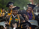 Morehouse graduate Leland Shelton is congratulated as he is acknowledged by President Obama. Morehouse graduate Leland Shelton is congratulated as he is acknowledged by President Obama.
