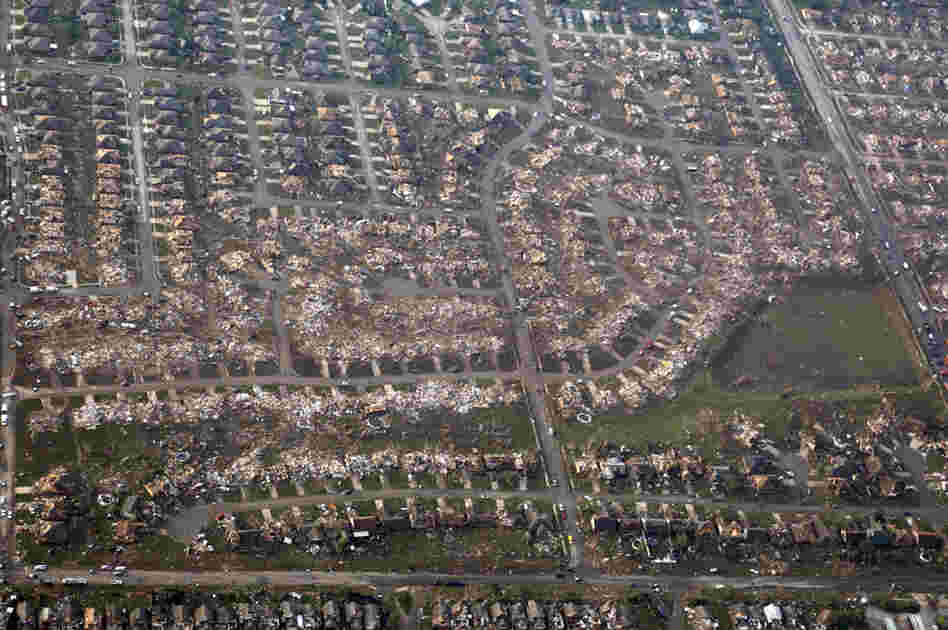 An aerial photo shows the remains of homes hit by the tornado in Moore on Monday. Forecasters warned that severe weather is possible in the area Tuesday.