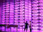 This "pinkhouse" at Caliber Biotherapeutics in Bryan, Texas, grows 2.2 million plants under the glow of blue and red LEDs.