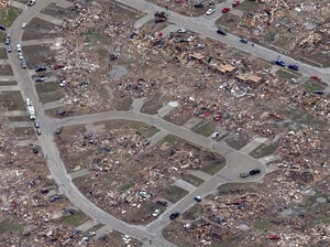An aerial view shows an entire neighborhood destroyed by Monday's tornado in Moore, Okla.