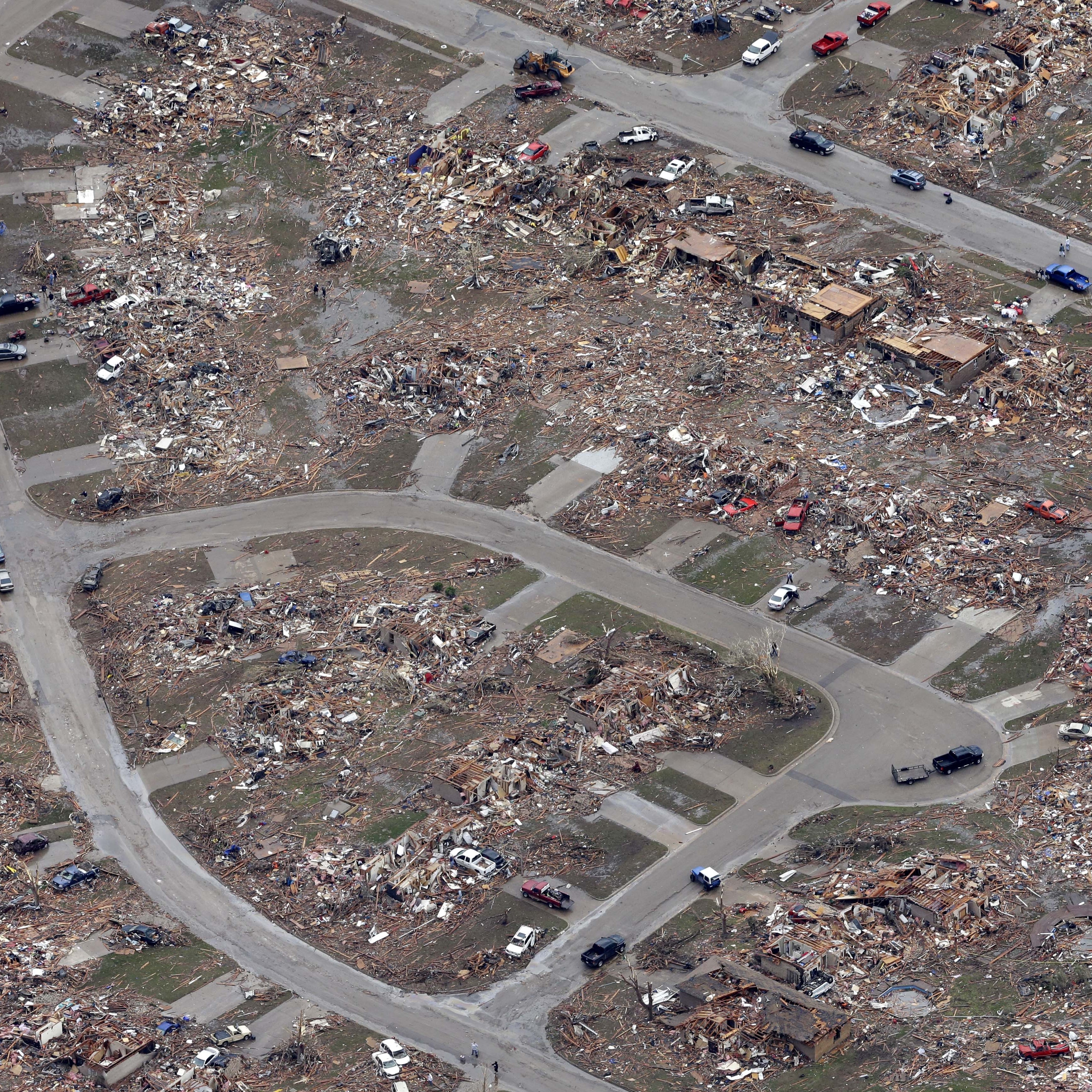 An aerial view shows an entire neighborhood destroyed by Monday's tornado in Moore, Okla.