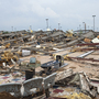 The destruction was wide and devastating in Moore, Okla., on Monday after a tornado roared through. The destruction was wide and devastating in Moore, Okla., on Monday after a tornado roared through.