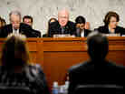 Senate Judiciary Chairman Patrick Leahy, D-Vt. (center), listens to testimony during a hearing on the immigration bill on April 22.
