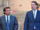 Francesco Schettino (left), the captain of the Costa Concordia, leaves court with  his lawyer, Francesco Pepe, last month. A judge has ordered Schettino to stand trial in the wreck of the cruise ship last year.