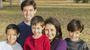 Elysha O'Brien and her husband, Michael, with sons (left to right) Gabriel, Joseph and Michael. Elysha never learned Spanish but is determined that her children will.