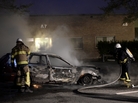 Swedish firemen extinguish a burning car Tuesday after youths rioted for a third night in a row in the suburbs of Stockholm. The unrest began after police said they shot dead a 69-year-old man wielding a machete in an immigrant neighborhood. Swedish firemen extinguish a burning car Tuesday after youths rioted for a third night in a row in the suburbs of Stockholm. The unrest began after police said they shot dead a 69-year-old man wielding a machete in an immigrant neighborhood.