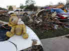 A teddy bear sits atop some of the rubble in Moore, Okla. A teddy bear sits atop some of the rubble in Moore, Okla.