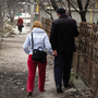 Oxana and Pavel Rucsineanu walk to the tuberculosis hospital in Balti, Moldova. Oxana and their new baby live in an apartment, but Pavel still has to stay at the TB ward, fighting for his life. Oxana and Pavel Rucsineanu walk to the tuberculosis hospital in Balti, Moldova. Oxana and their new baby live in an apartment, but Pavel still has to stay at the TB ward, fighting for his life.