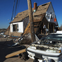 Floodwaters from Superstorm Sandy destroyed the first floor of this house in Staten Island, New York. Most of the people who drowned during the storm died in their homes in low-lying areas of New York and New Jersey. Floodwaters from Superstorm Sandy destroyed the first floor of this house in Staten Island, New York. Most of the people who drowned during the storm died in their homes in low-lying areas of New York and New Jersey.