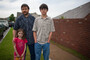 Cary Smith picked up his son Jordan, 13, and daughter Tia, 5, from Eastlake Elementary School on Thursday. Smith picked his children up from school right before the tornado came through Moore, Okla. He and the family live close to Plaza Elementary School and he ran to the school to help pull a teacher and three kids from the ruble in the aftermath of the tornado on Monday.