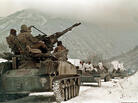 Russian soldiers take their position near the village of Shatoy, Chechnya. Russian soldiers take their position near the village of Shatoy, Chechnya.