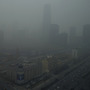 Skyscrapers are obscured by heavy haze in Beijing on Jan. 13. Air pollution remains a serious, sometimes overwhelming problem, but researchers say environmental technology is available to solve it.