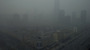 Skyscrapers are obscured by heavy haze in Beijing on Jan. 13. Air pollution remains a serious, sometimes overwhelming, problem, but researchers say environmental technology is available to solve it.
