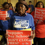 Protesters of Chicago Mayor Rahm Emmanuel's plan to close dozens of city schools rally in the Capitol rotunda in Springfield, Ill., on Wednesday. The Chicago Board of Education voted to close 50 schools.